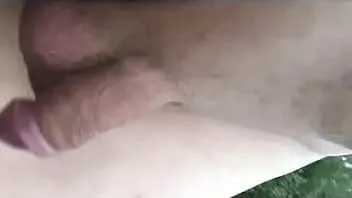 Play Short naked walk with foreskin retracted